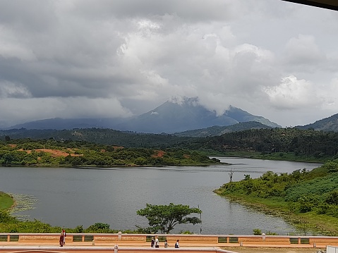 Boating facility at Karapuzha Dam surrounded by hills